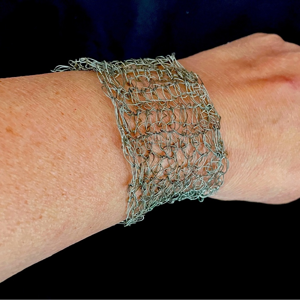 Sterling silver hand crocheted bracelet mesh silver magnetic closure.